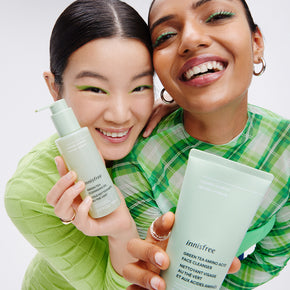 Green Tea Cleansing Oil & Amino Acid Cleanser with models holding packaging