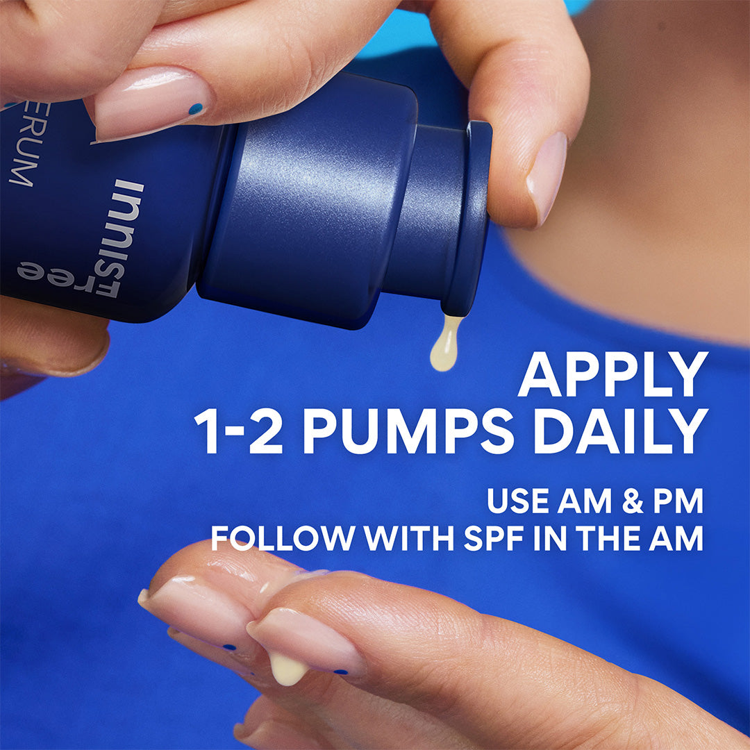 Hand applying skincare product with text on a blue background