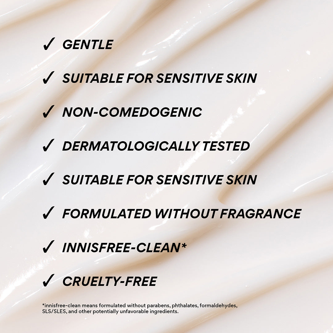 A close-up of a thick, creamy off-white cosmetic cream with text overlays listing product benefits such as 'GENTLE', 'SUITABLE FOR SENSITIVE SKIN', 'NON-COMEDOGENIC', and 'DERMATOLOGICALLY TESTED'.