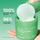 Enlarge image of Green Tea Panthenol Calming Toner Pads claims with a hand holding the toner pads