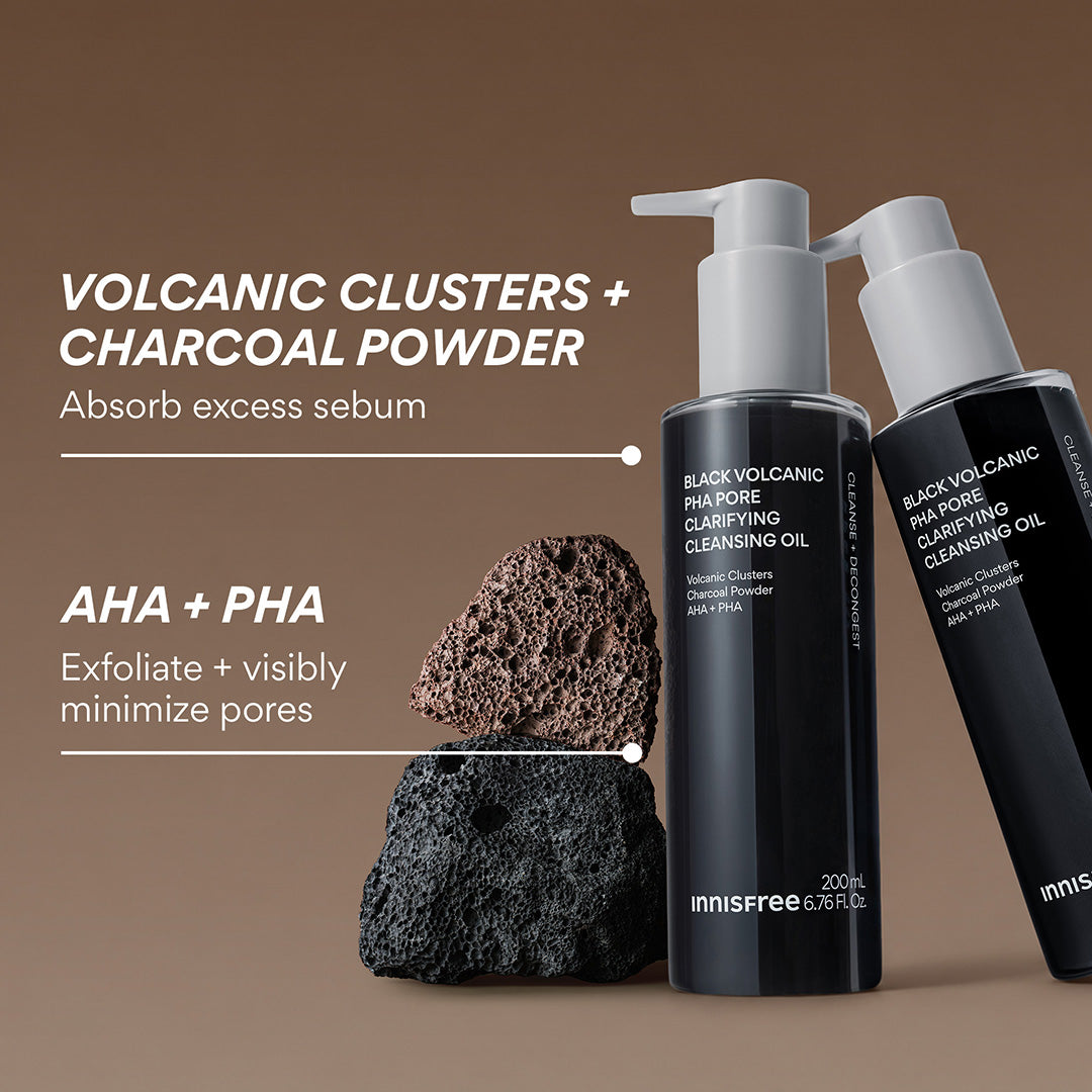 Two Innisfree Black Volcanic PHA Cleansing Oil products on a warm brown background, with descriptive marketing text and two porous sponge blocks in front of the bottles.