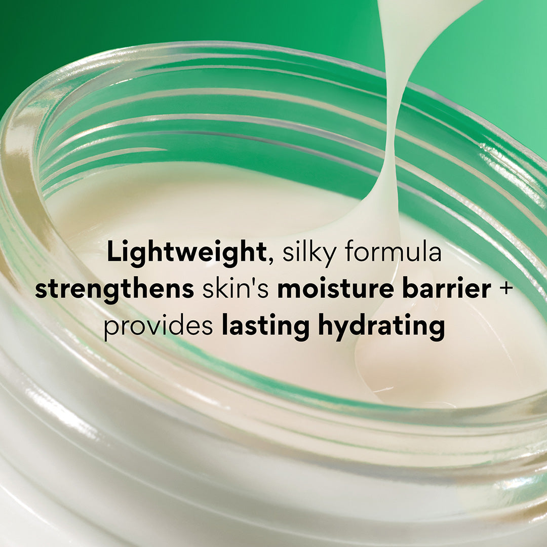 Close-up of a clear jar filled with a Green Tea Hyaluronic Cream with a green background and overlaid text reading 'Lightweight, silky formula strengthens skin's moisture barrier + provides lasting hydrating'.