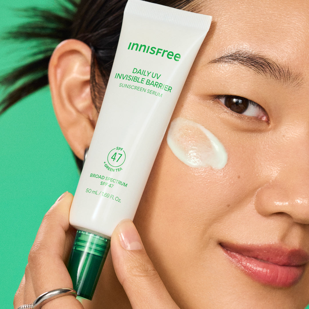 Daily UV Invisible Barrier Sunscreen Serum Broad Spectrum SPF 47 with Green Tea model with texture swatch
