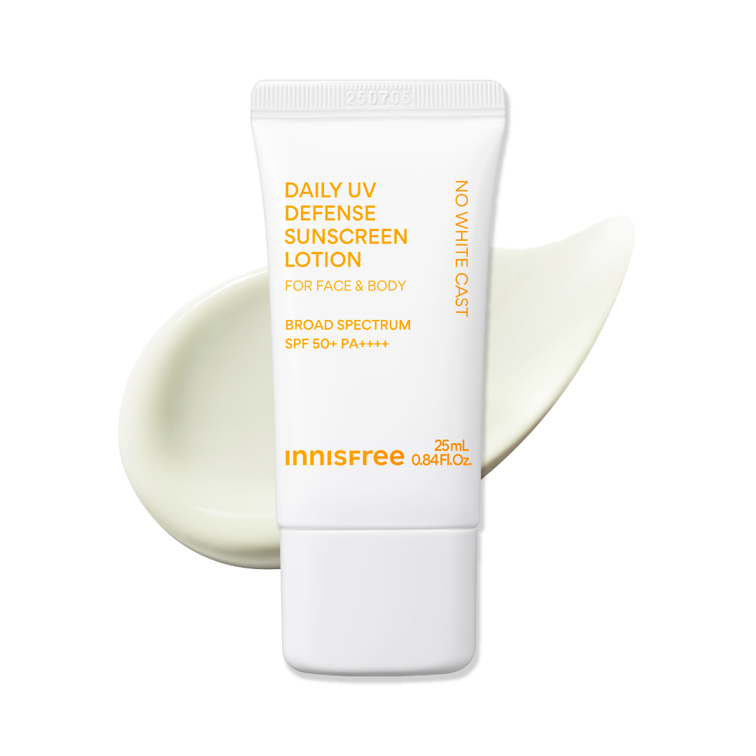 Innisfree Daily UV Defense Sunscreen Lotion SPF 60+ PA++++ 25mL in a white squeeze tube with orange text, shown in front of a pale cream-colored lotion smear on a white background.