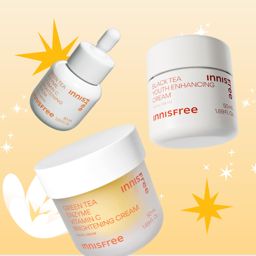 Three Innisfree skincare products on a pale yellow background: Black Tea Youth Enhancing Cream, Green Tea Enzyme Vitamin C Brightening Cream, and Black Tea Youth Enhancing Cream, with starburst graphics and white leaf silhouettes.