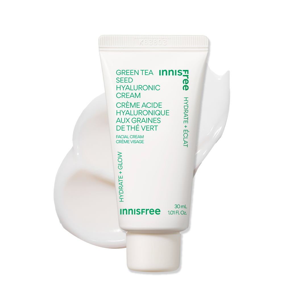 Innisfree Green Tea Seed Hyaluronic Cream 30mL in a white squeeze tube with green text, displayed against a white background with a decorative smear of the cream behind it.