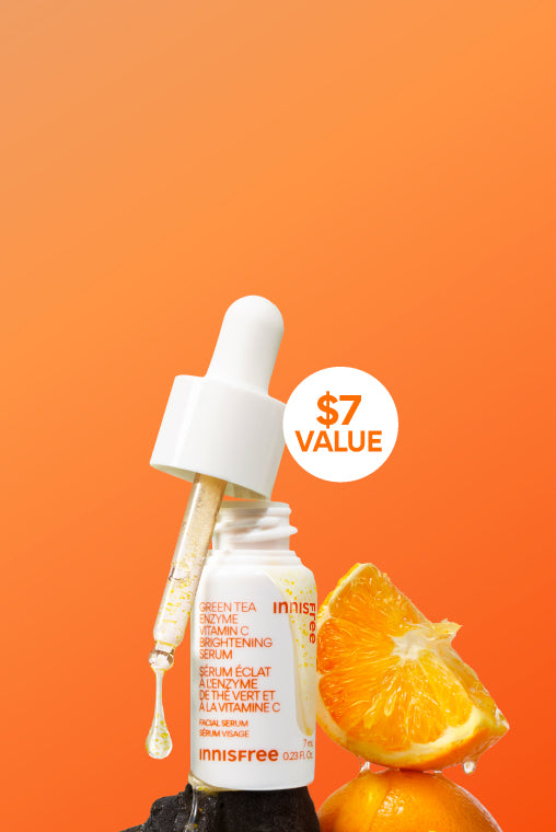  innisfree Vitamin C Serum 7mL with a dropper styled with an orange slice and an orange fruit on a solid orange background with a '$7 VALUE' badge.