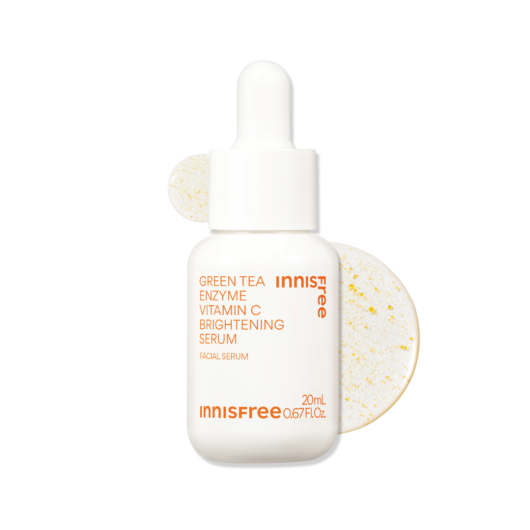 Innisfree Green Tea Enzyme Vitamin C Brightening Serum in a 20mL white dropper bottle, shown on a clean white background with texture swatch behind it.