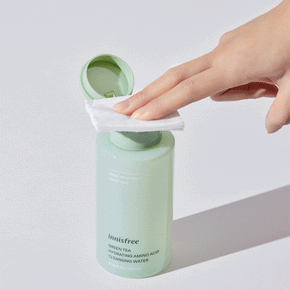Green Tea Micellar Cleansing Water with hand pressing cotton pad GIF animation