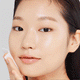 Enlarge image of Model applying Green Tea Hyaluronic Acid Toner with cotton pad GIF animation