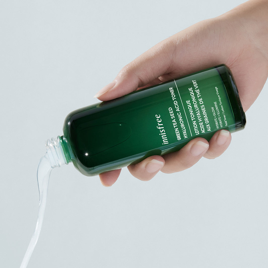 Green Tea Hyaluronic Acid Toner Texture pouring out of bottle